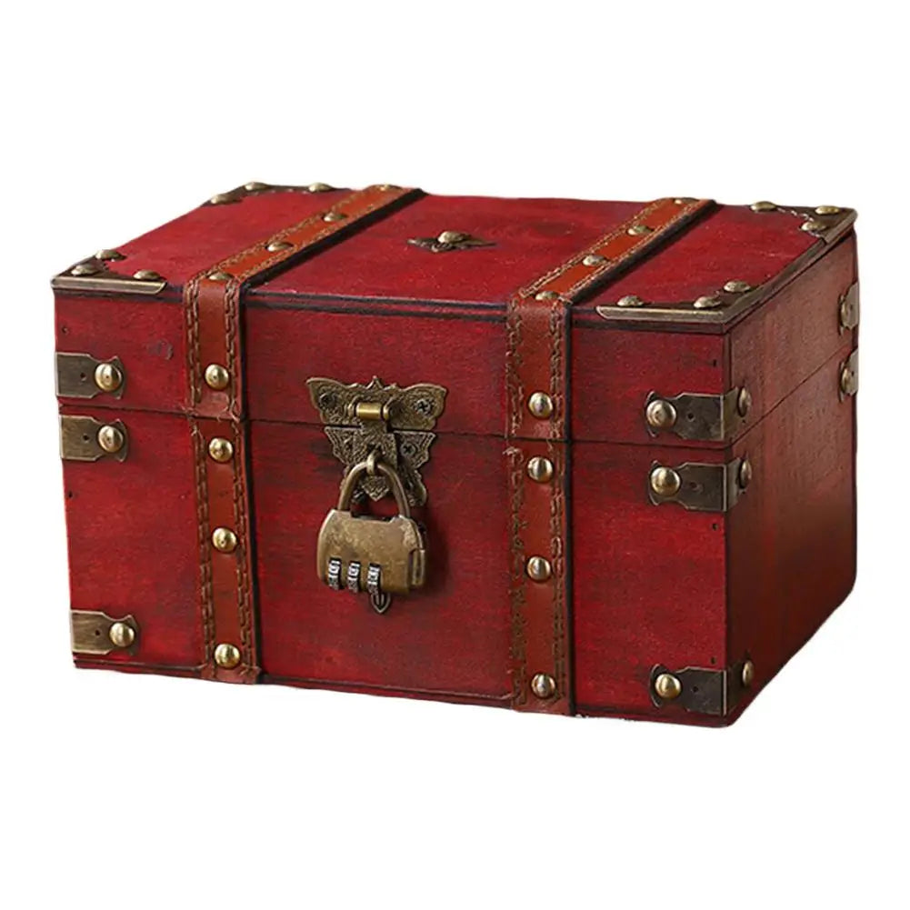 Red wooden treasure chest with brass lock on a white background