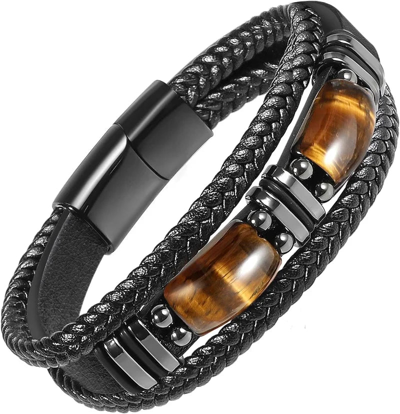 Black braided leather bracelet with brown tiger eye stones and metal accents on a white background