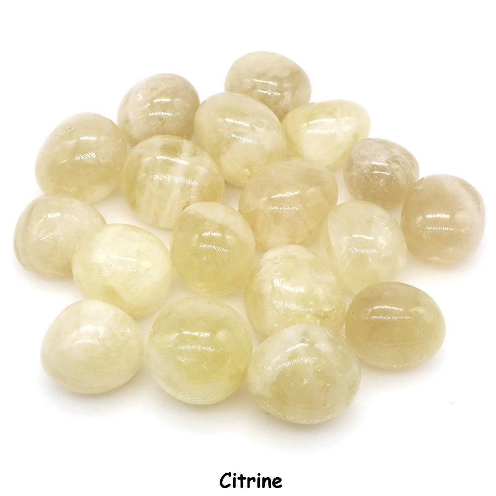 Citrine gemstones on a white background