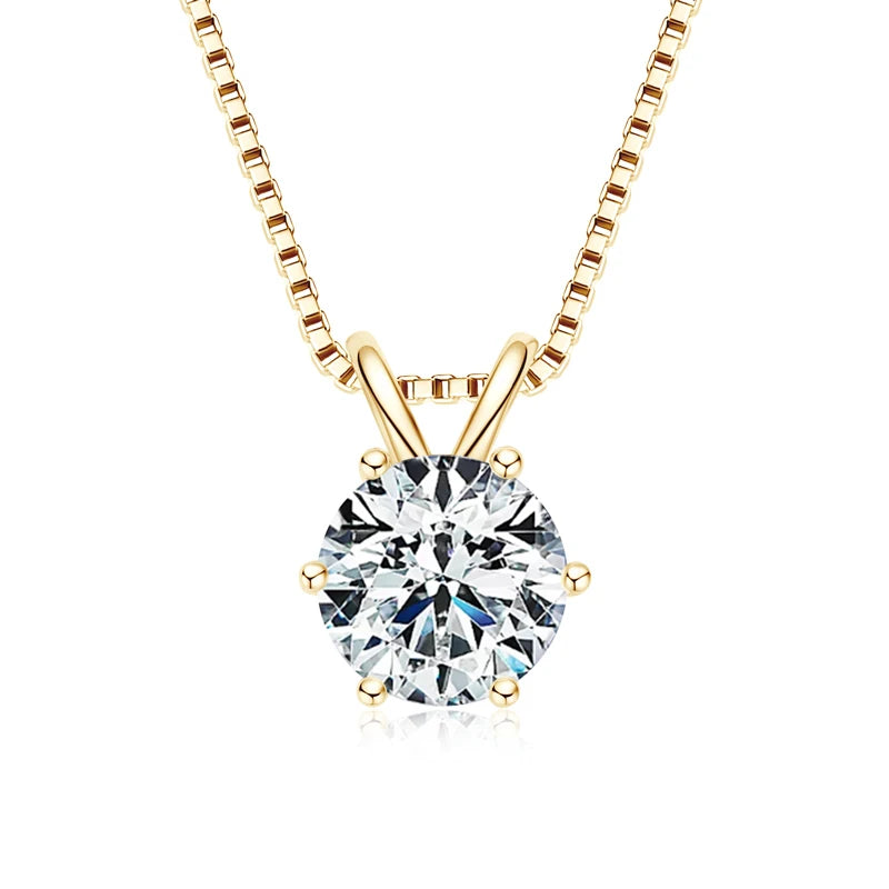 Gold necklace with a round diamond pendant on a white background