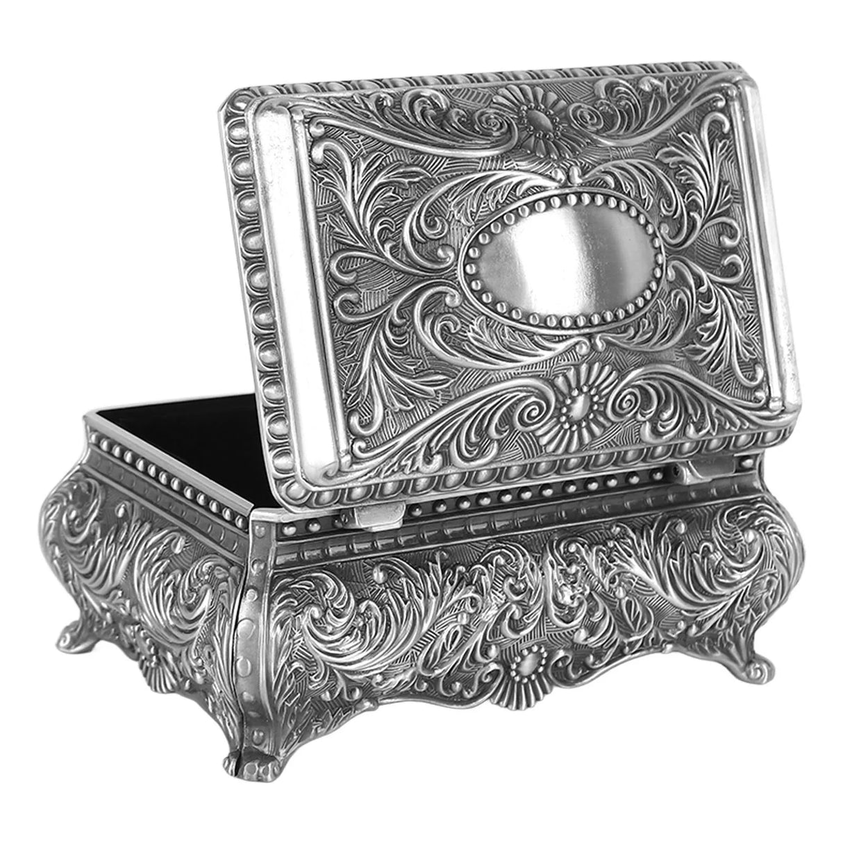 Decorative silver box with intricate patterns on a white background