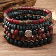 Stack of beaded bracelets with red, black, and brown colors on a wooden surface