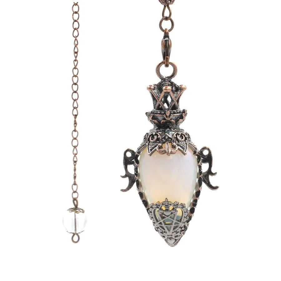 Decorative pendant necklace with intricate design on a white background
