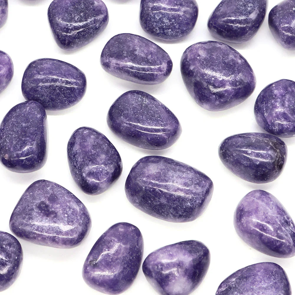 Purple stones on a white background