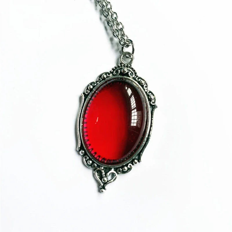 Necklace with a red pendant on a white background