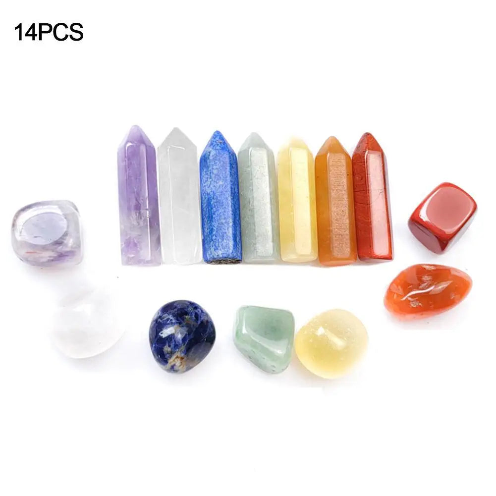Set of 14 colorful crystal points on a white background