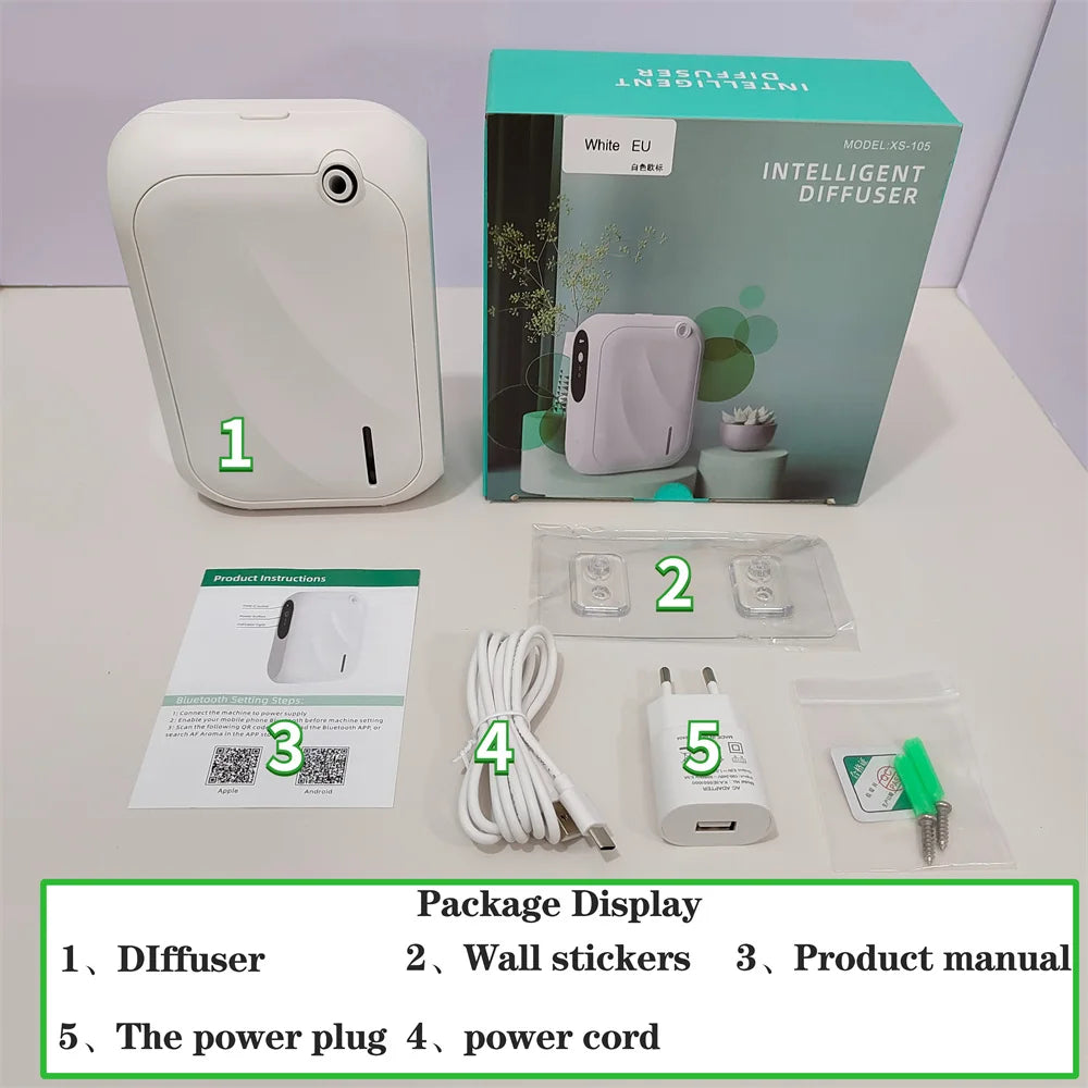 Intelligent diffuser package with diffuser, wall stickers, product manual, power cord, and power plug on a white surface.