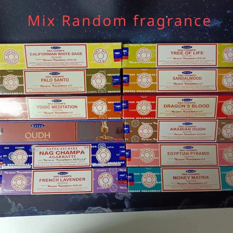 Stack of Nag Champa incense boxes with various fragrances on a dark background.