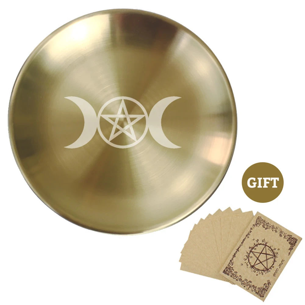 Gold disc with a pentacle and moon symbol, accompanied by brown cards with similar symbols, on a white background.
