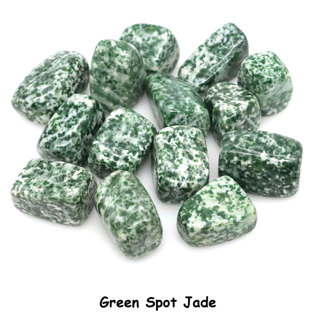 Green Spot Jade stones on a white background