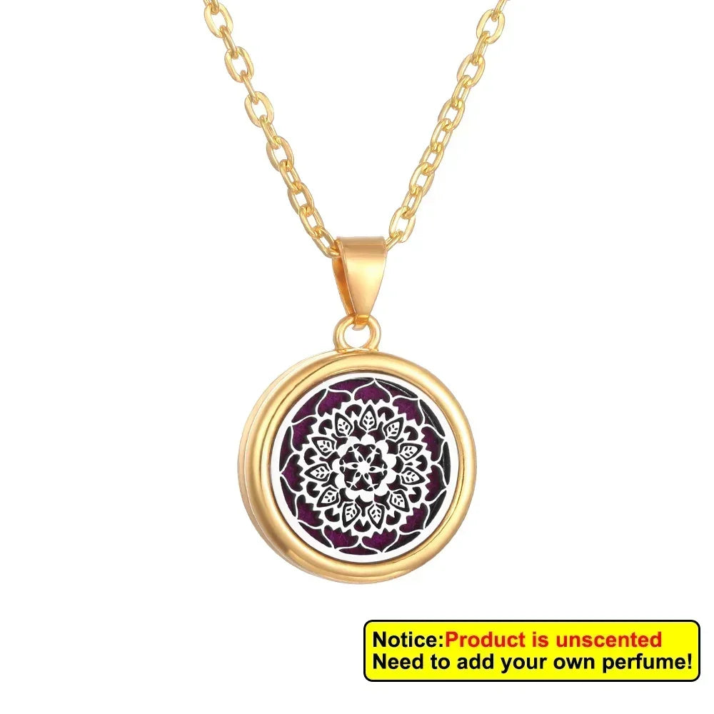 Gold necklace with a round pendant featuring a mandala design on a white background.