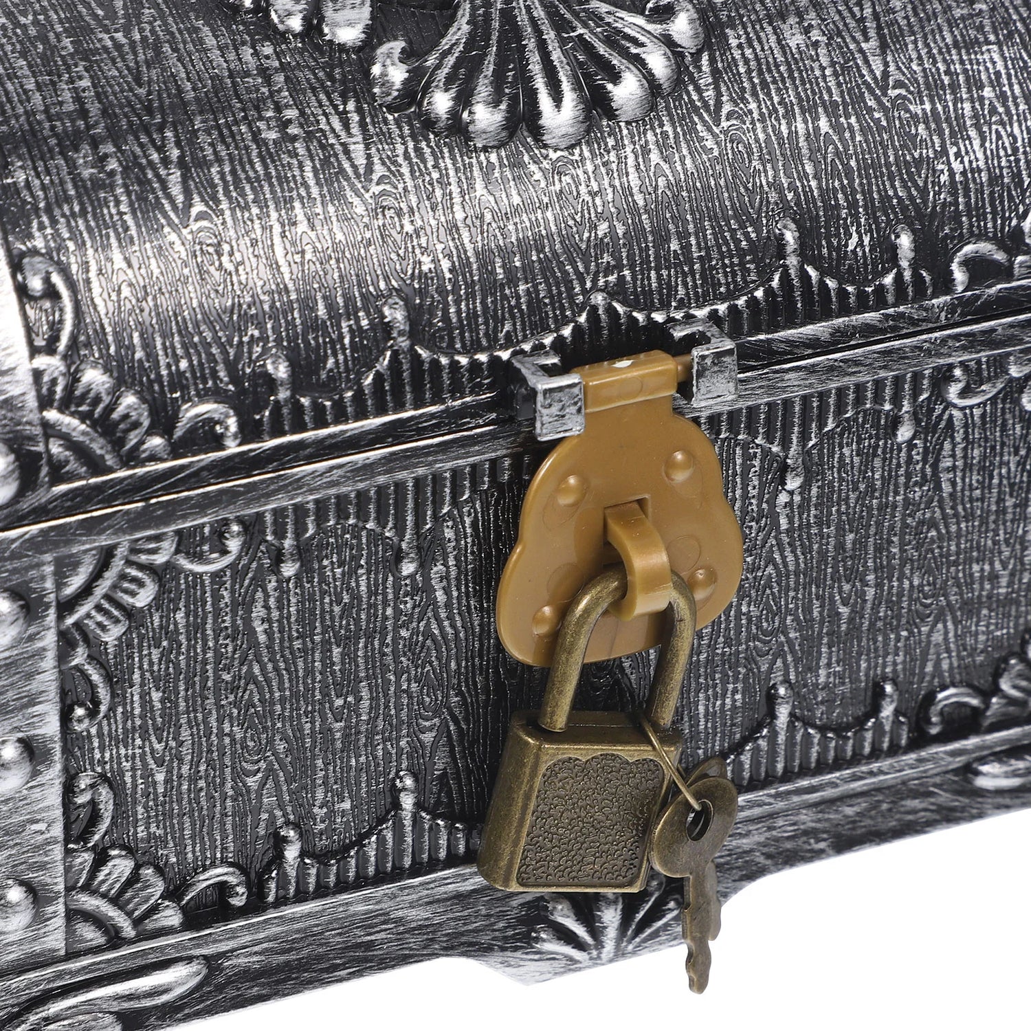 Decorative metal chest with a gold lock and key on a white background