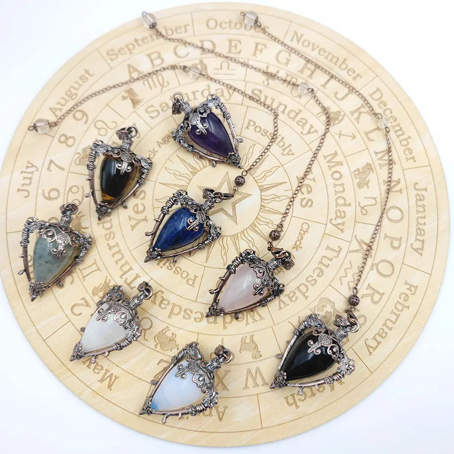 Necklaces with heart-shaped gemstones on a circular calendar background