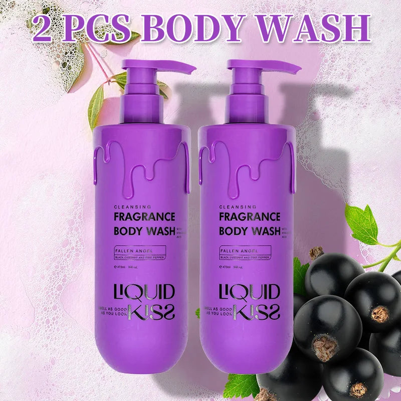 Two bottles of Liquid Kiss body wash with black currants on a light pink background