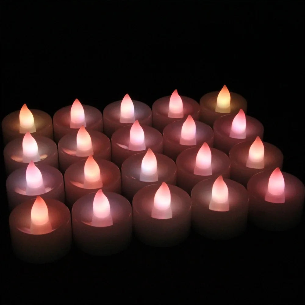 Set of LED candles with a warm glow on a black background