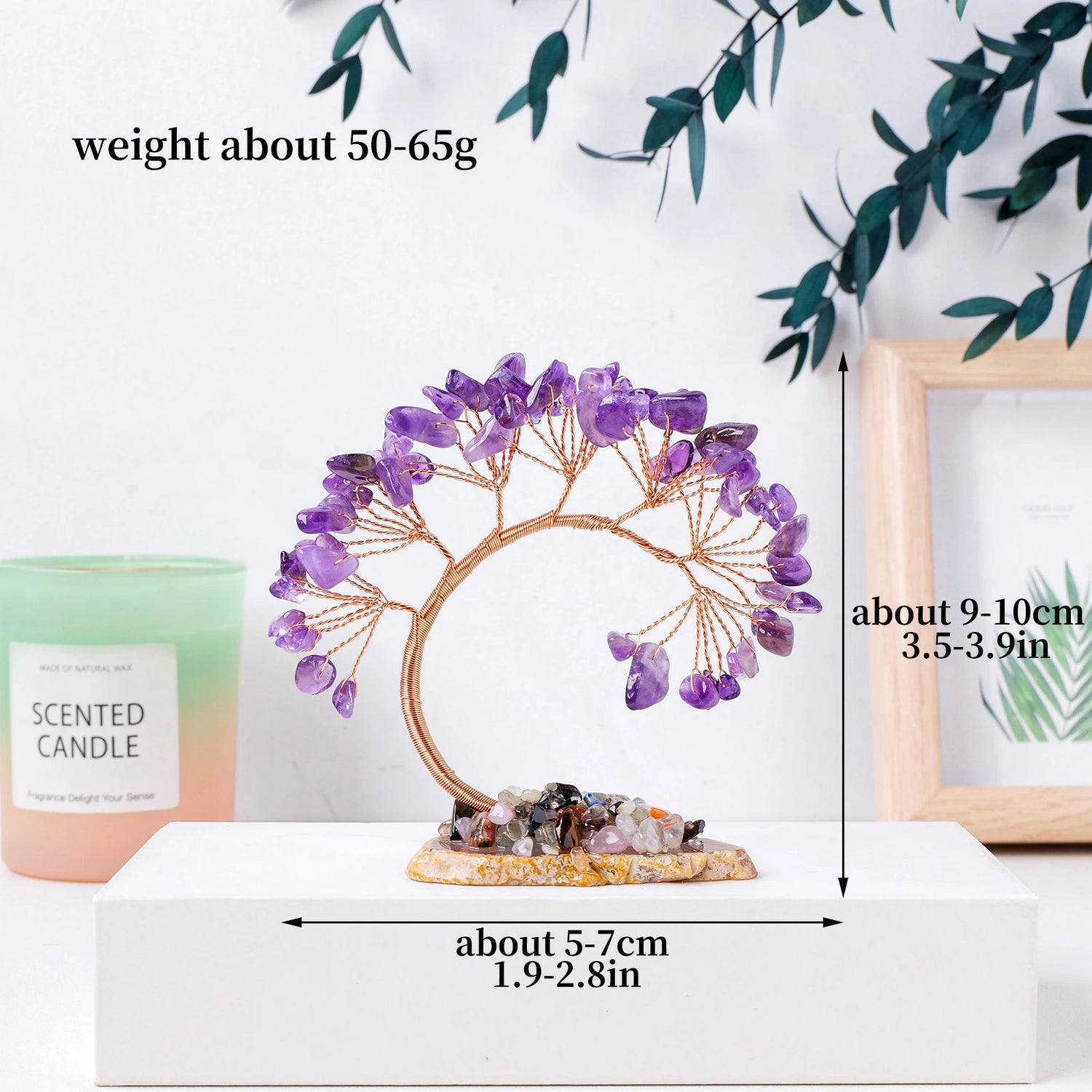Decorative crystal tree with measurements and weight information on a white surface.
