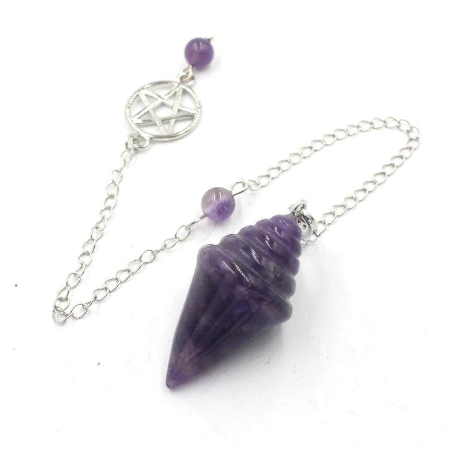 Purple crystal pendulum with silver chain on a white background