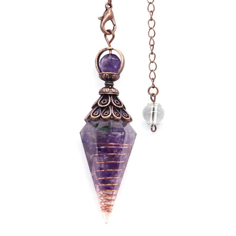 Amethyst crystal pendulum with copper accents on a white background