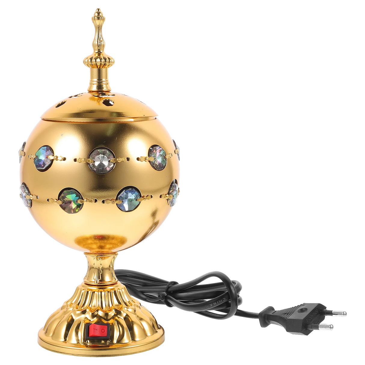 Decorative gold lamp with gemstone accents on a white background