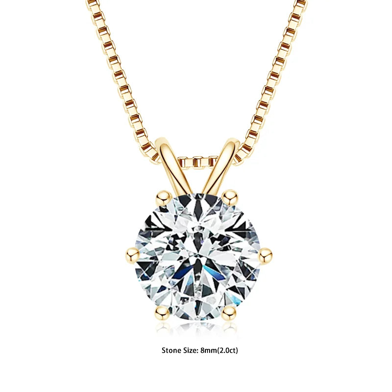 Gold necklace with a round diamond pendant on a white background