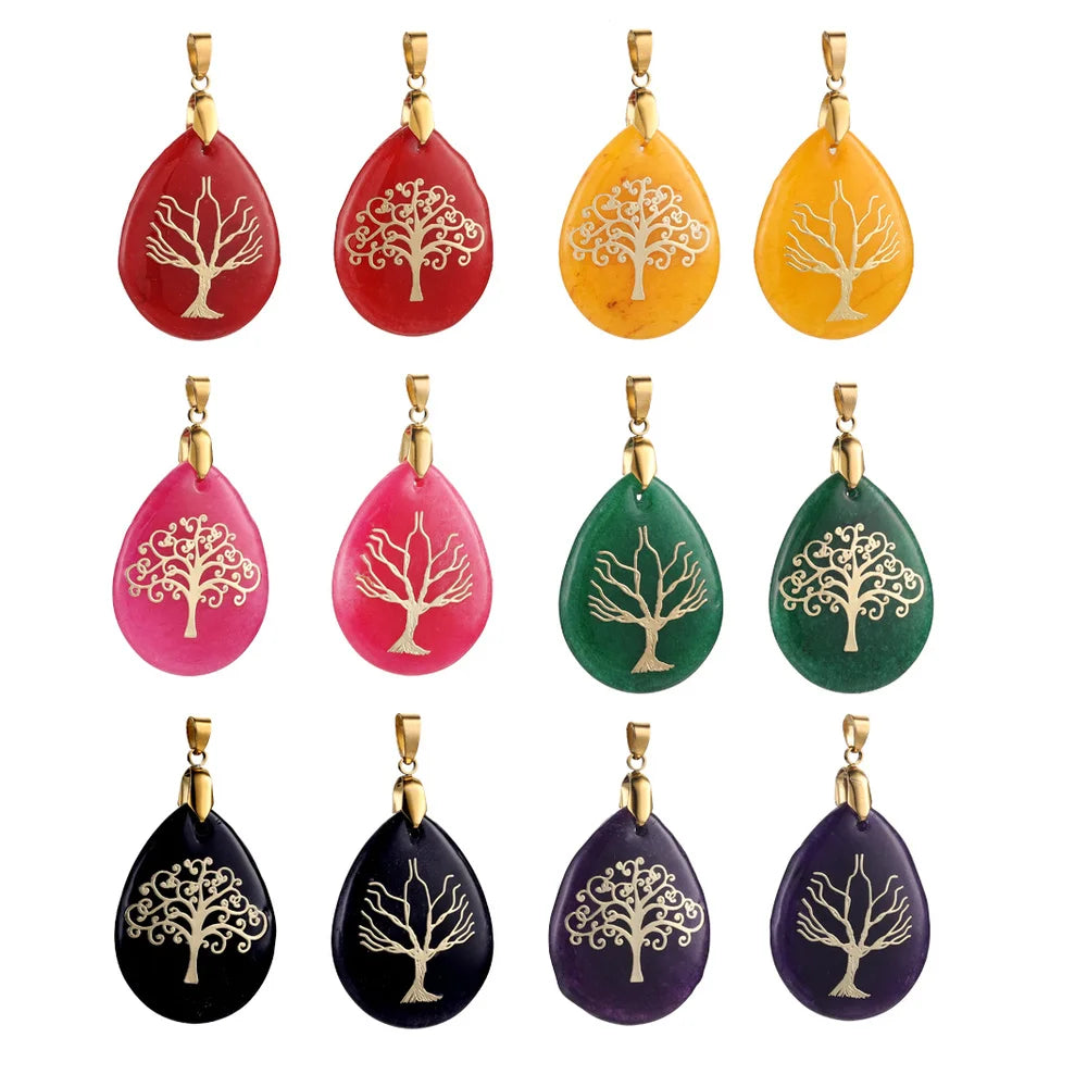 Set of colorful teardrop-shaped pendants with tree designs on a white background
