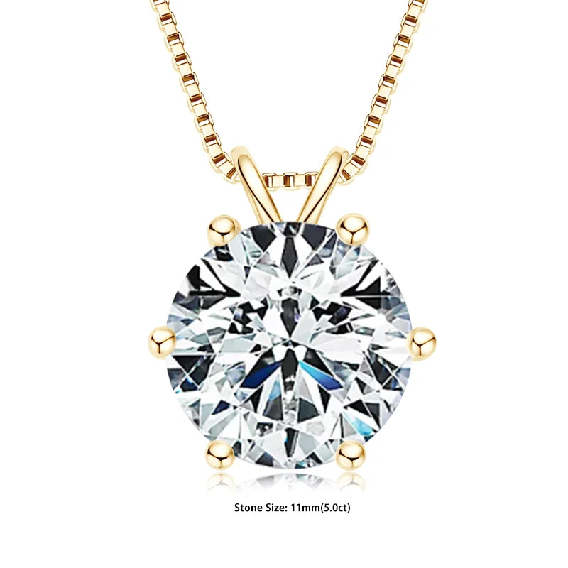 Gold necklace with a round diamond pendant on a white background