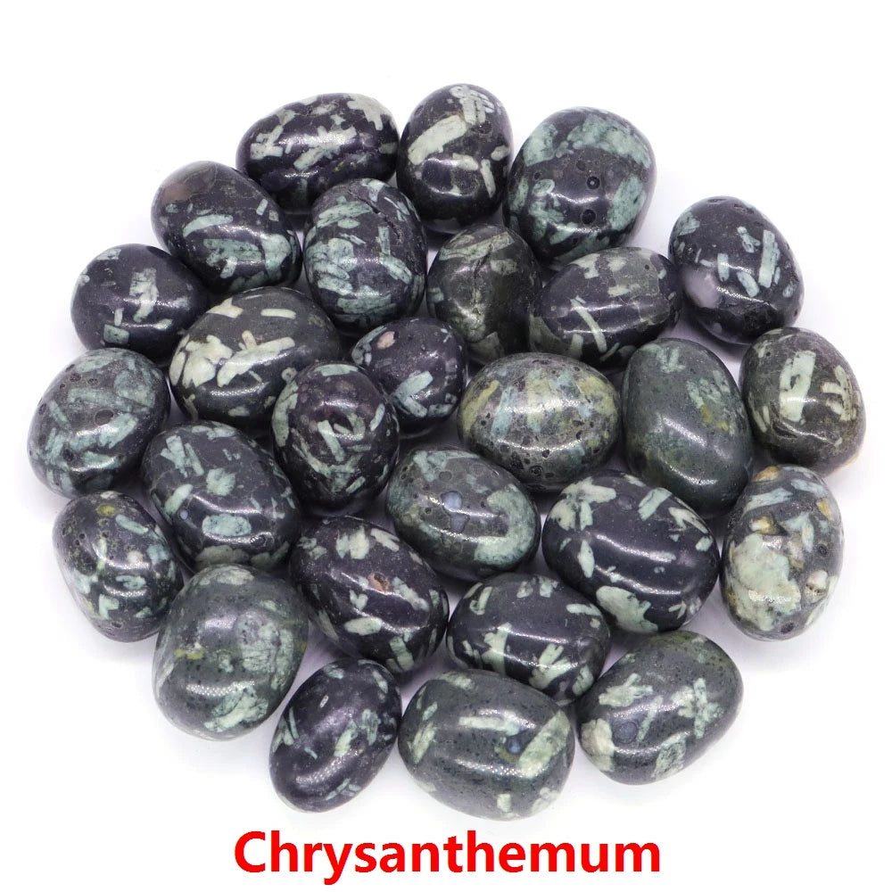 Collection of chrysanthemum-patterned stones on a white background