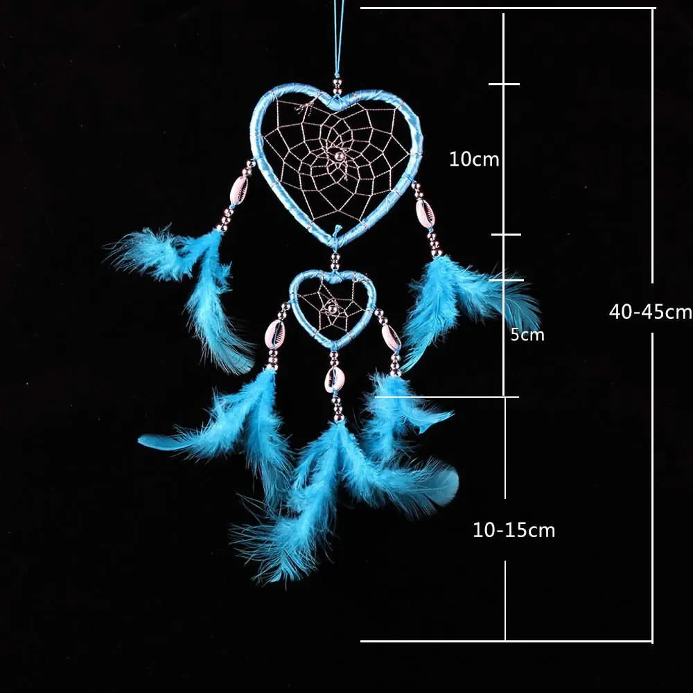 Blue heart-shaped dreamcatcher with feathers and measurements on a black background