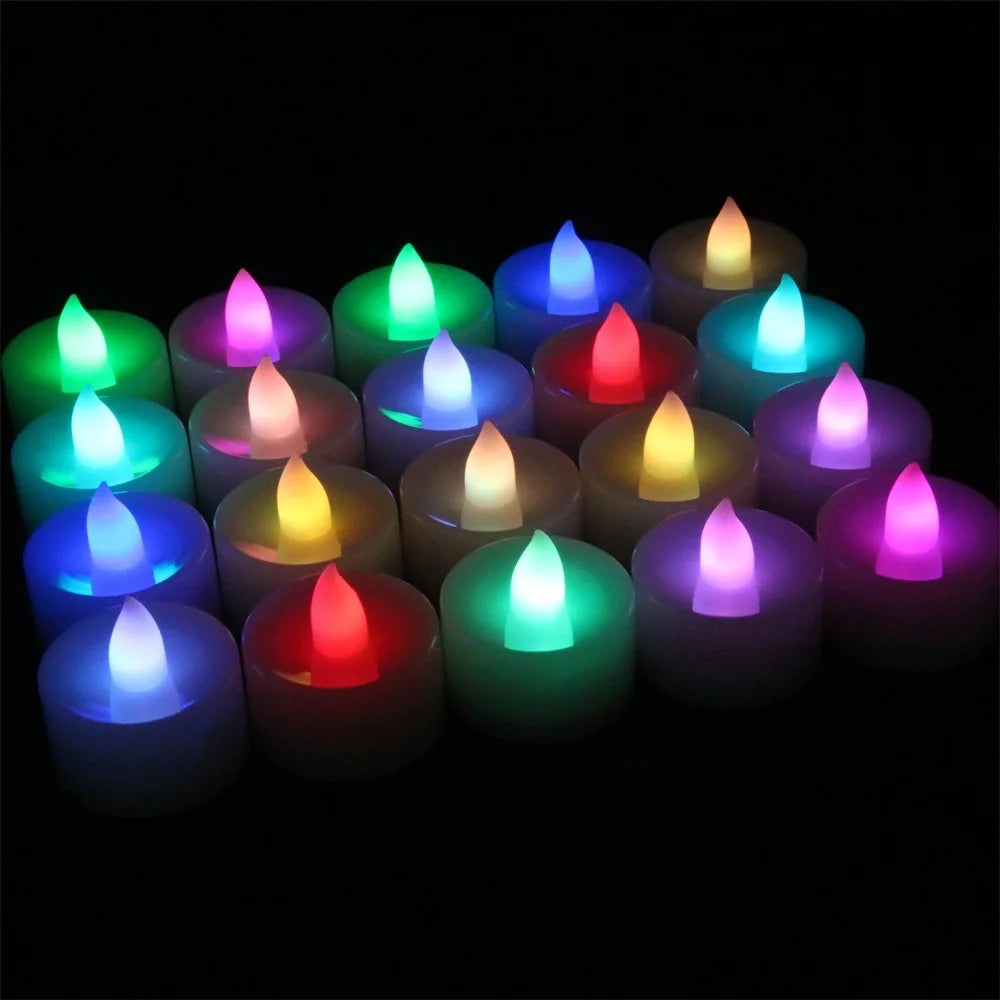 Colorful LED candles on a black background