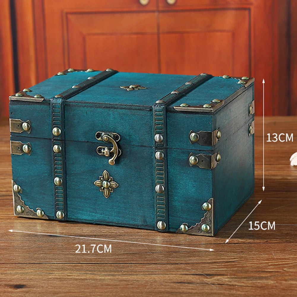 Blue wooden treasure chest with measurements on a wooden surface