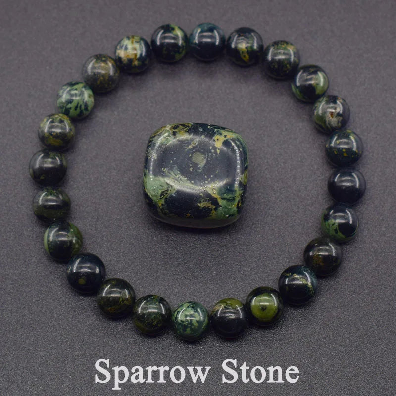 Beaded bracelet with a central stone on a gray background, labeled 'Sparrow Stone'.