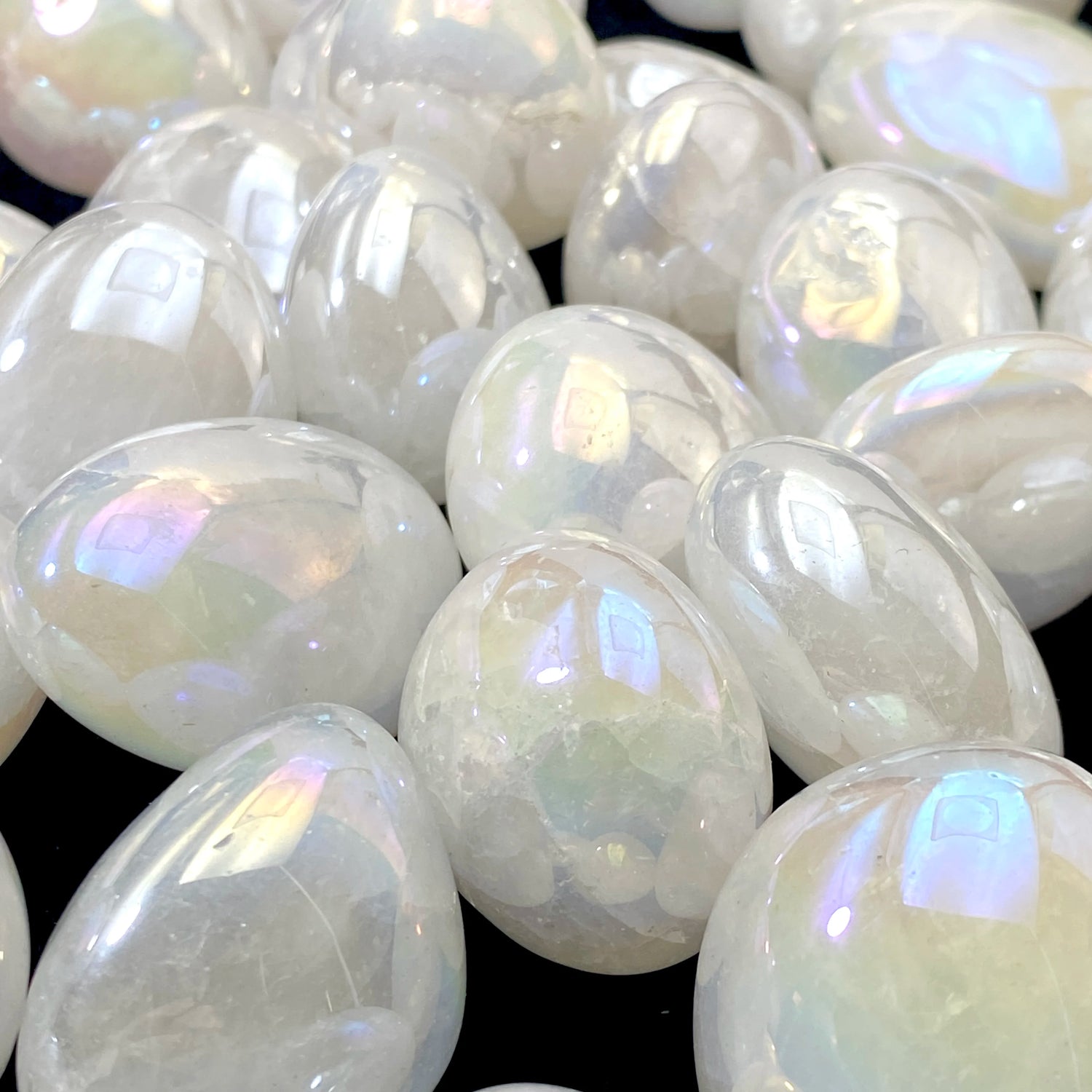 Opalite stones with a glossy finish on a black background