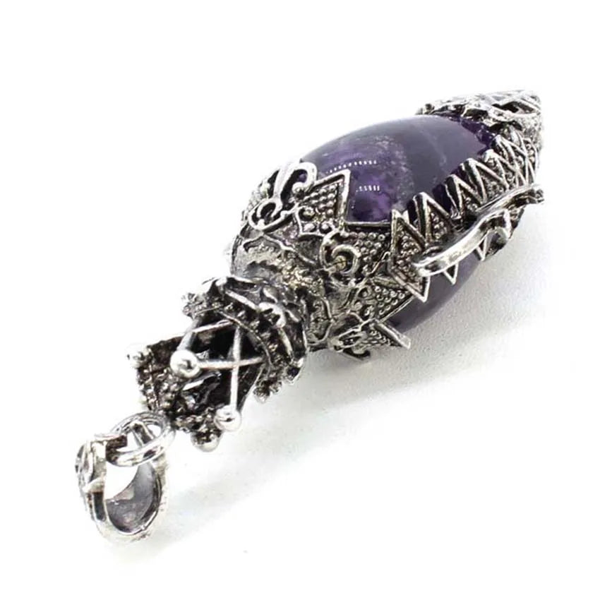 Silver pendant with purple gemstone on a white background