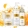 Set of skincare products with orange slices on a white background