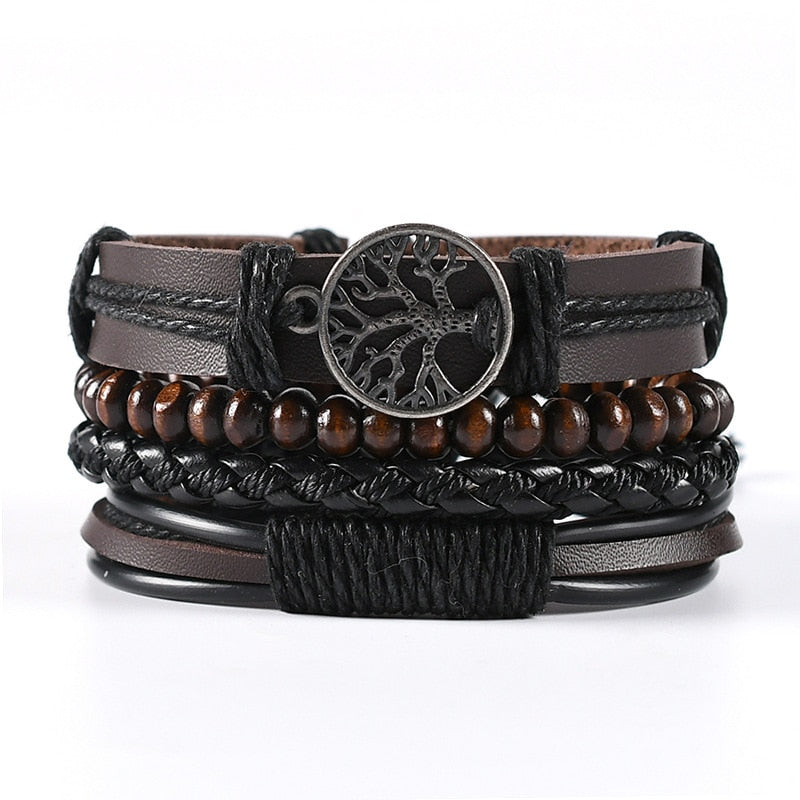Multistrand leather and wood bracelet with tree of life charm on a white background