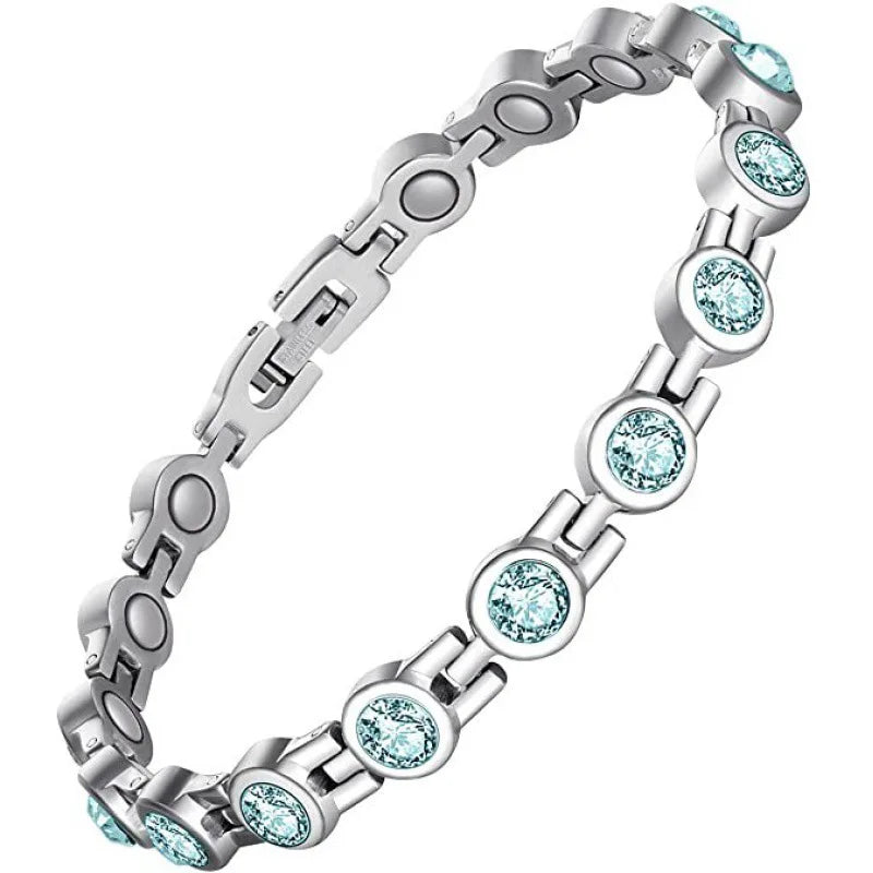 Silver bracelet with turquoise gemstones on a white background
