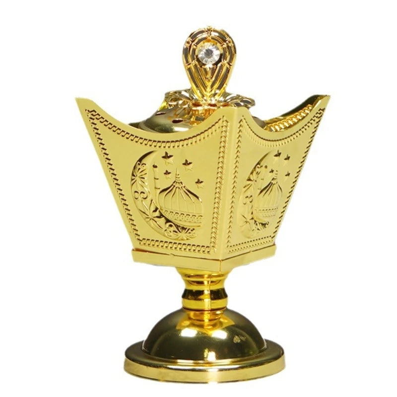 Gold decorative item with intricate designs on a white background