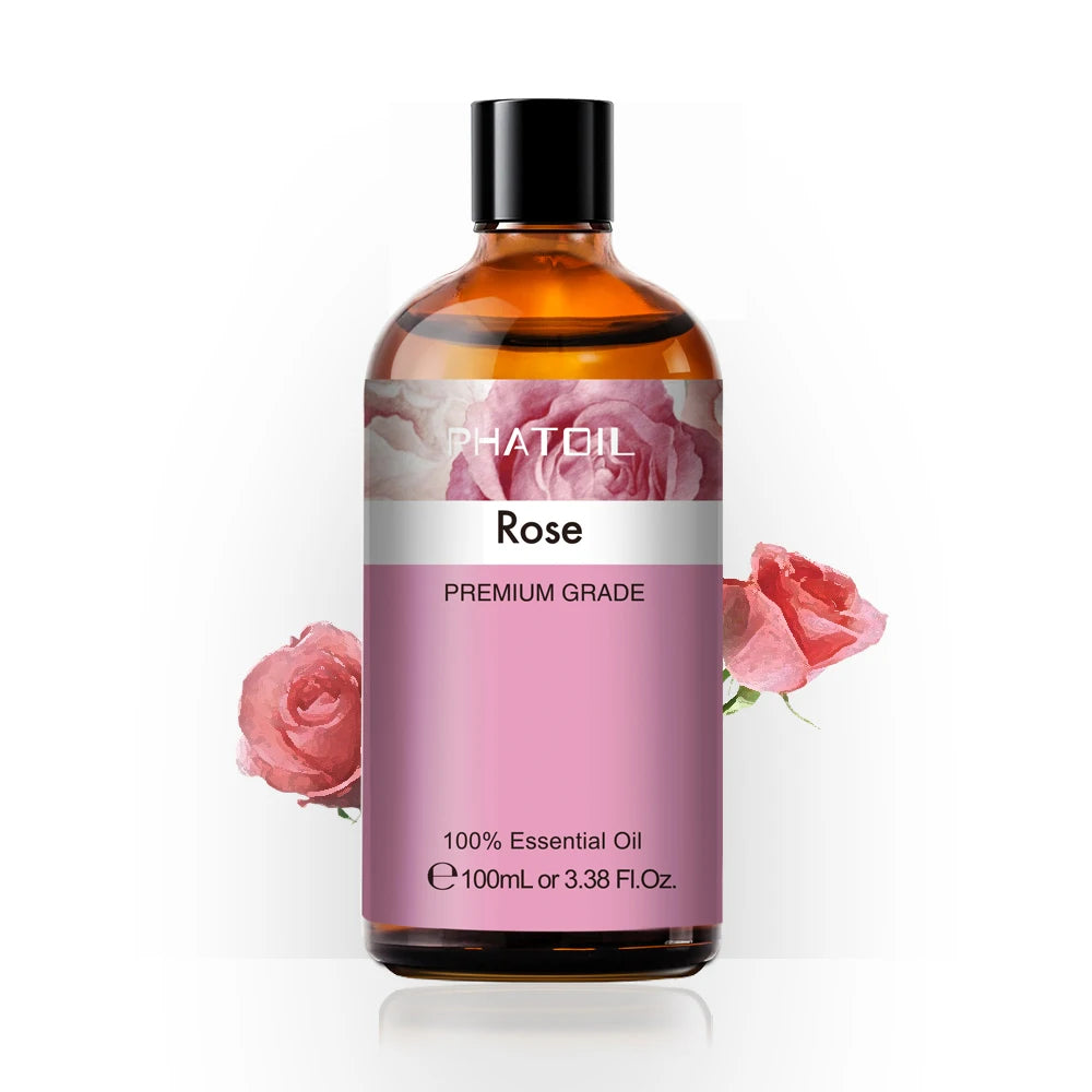 Bottle of Phat Oil Rose essential oil with pink roses on a white background
