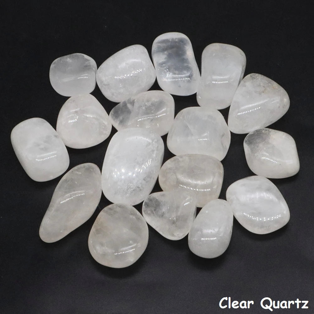 Clear quartz stones on a black background