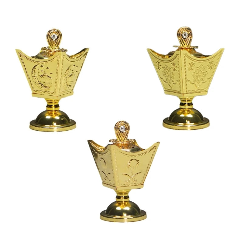 Three gold decorative items on a white background