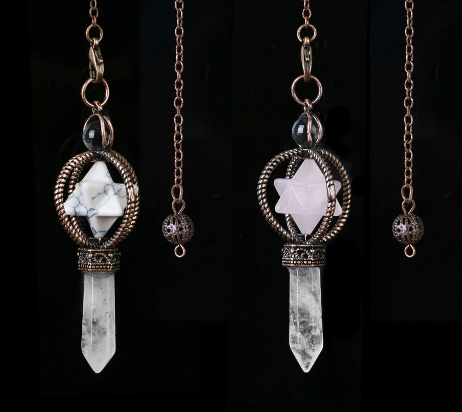 Two crystal pendant necklaces on chains against a black background, with 'Cala Jewelry' logo.