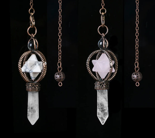 Two crystal pendant necklaces on chains against a black background, with 'Cala Jewelry' logo.