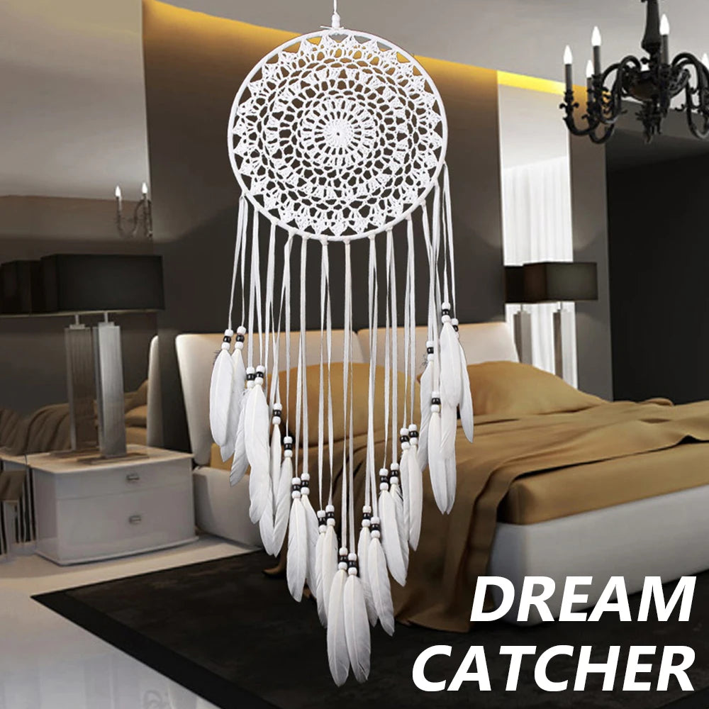 White dreamcatcher hanging above a bed in a bedroom with 'Dream Catcher' text overlay.