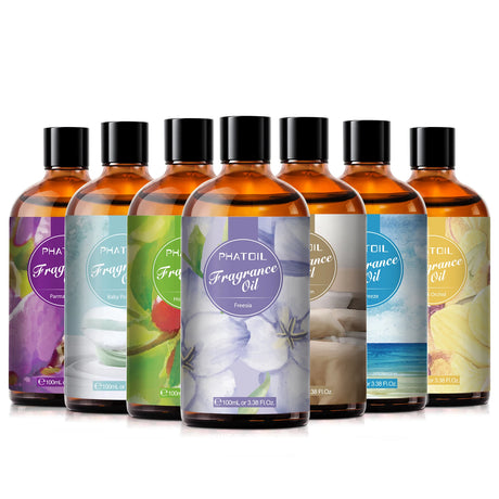 Set of Phat Oil fragrance oil bottles with colorful labels on a white background