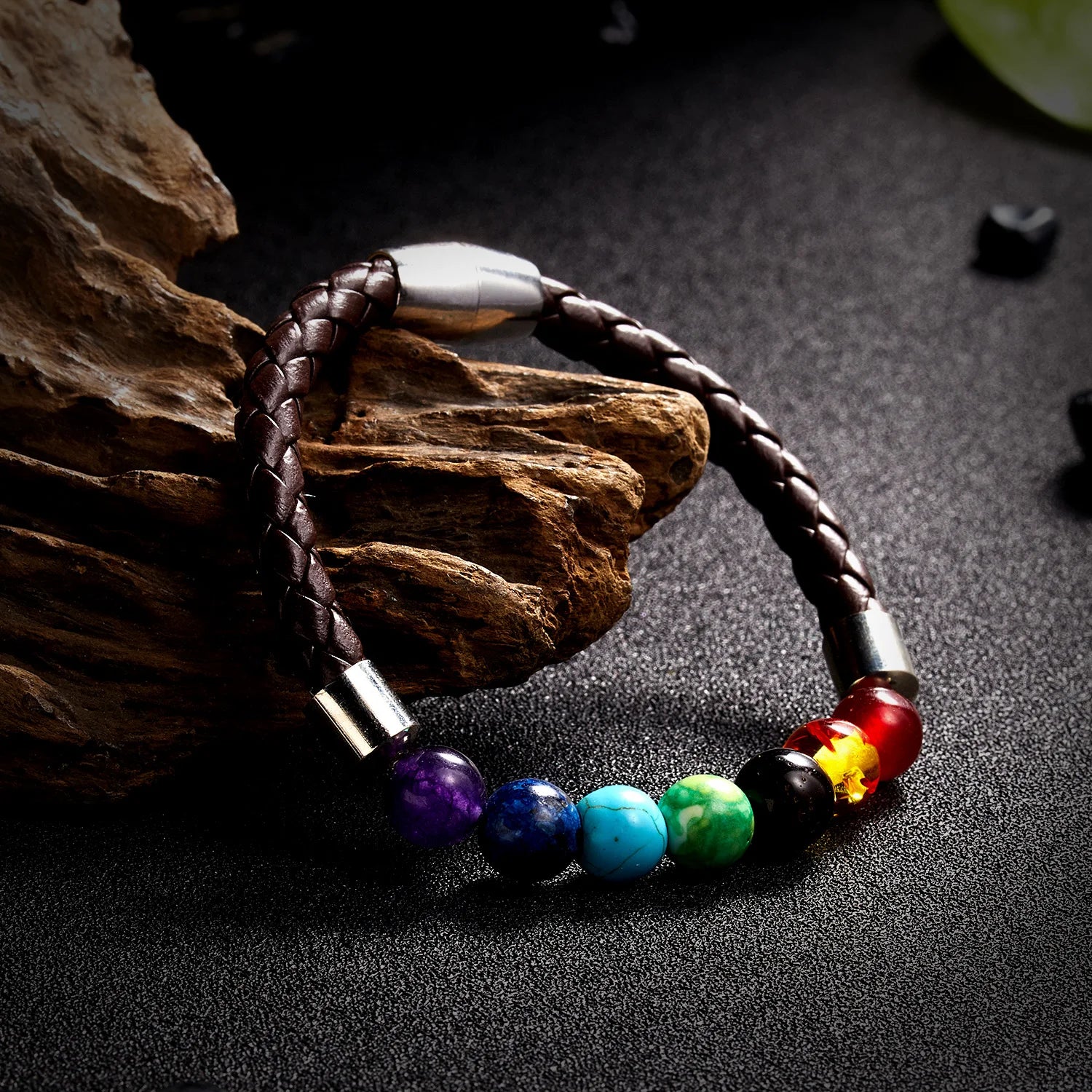 Bracelet with colorful beads on a dark surface