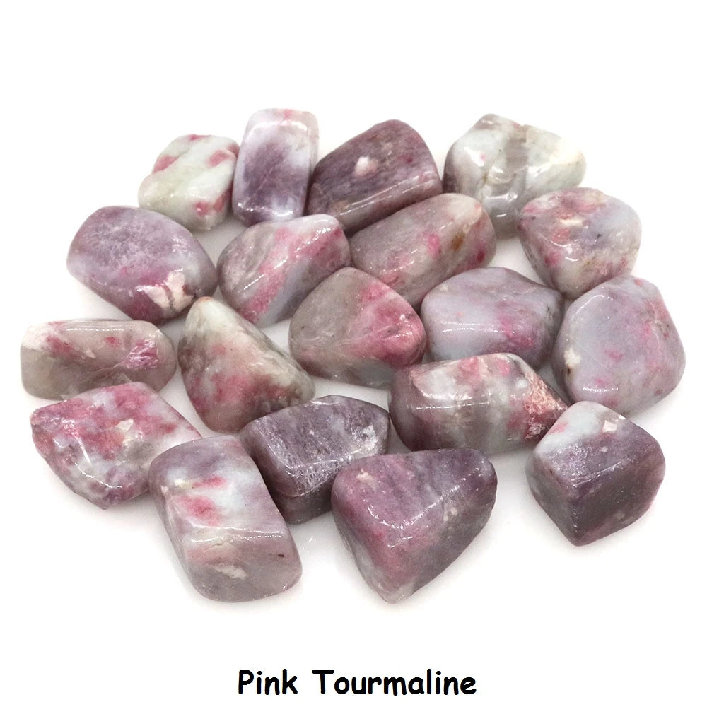 Pink tourmaline stones on a white background