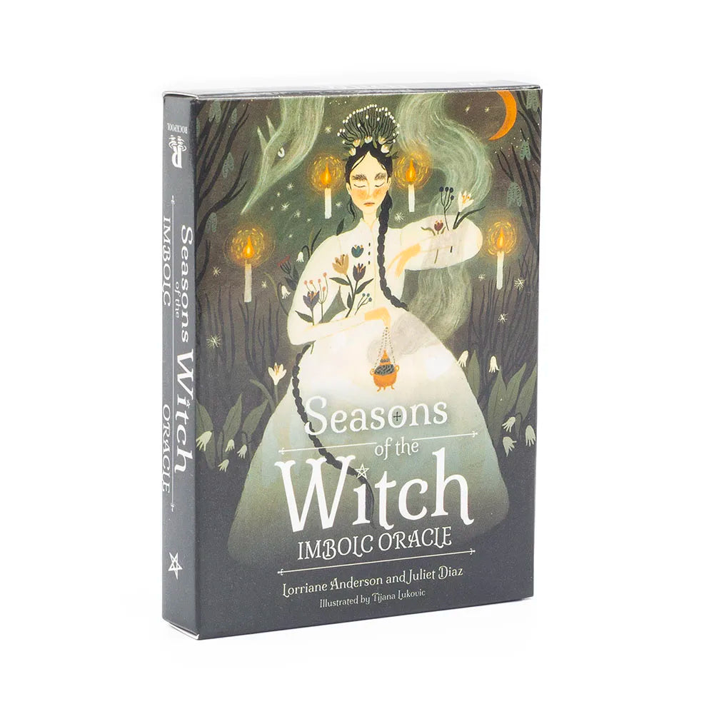 Book titled 'Seasons of the Witch Imbolc Oracle' with an illustration of a woman in a white dress surrounded by candles and nature elements.