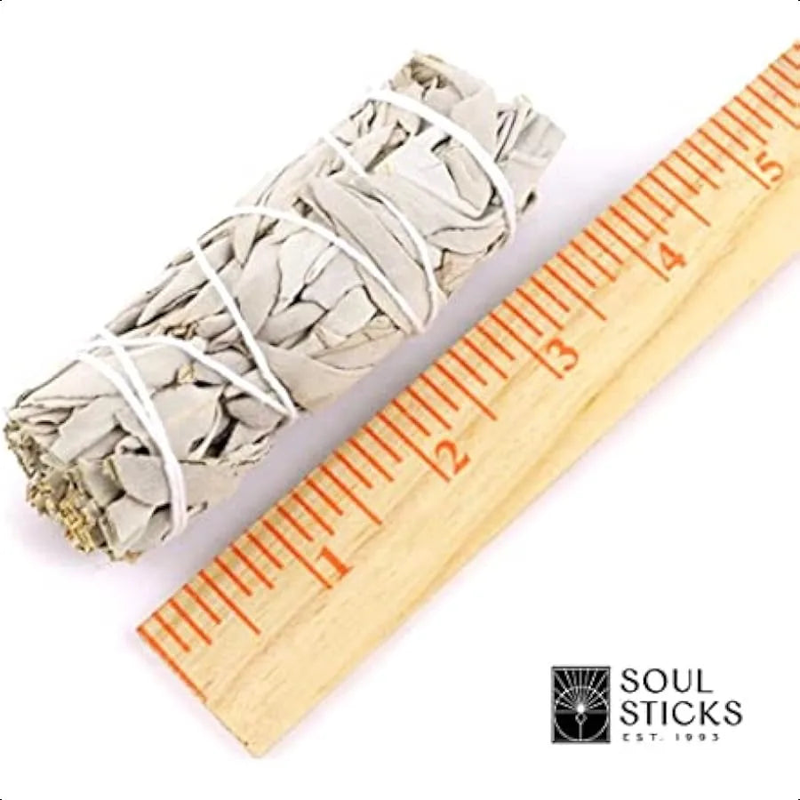 Bundled sage sticks with a ruler next to them, featuring the Soul Sticks brand.