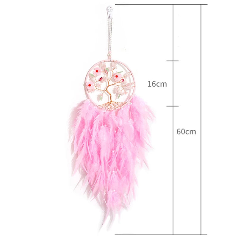 Pink feathered dreamcatcher with measurements on a white background