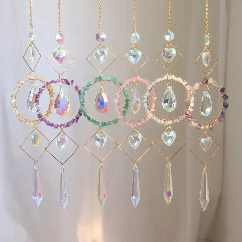 Colorful crystal hanging decorations on a plain background